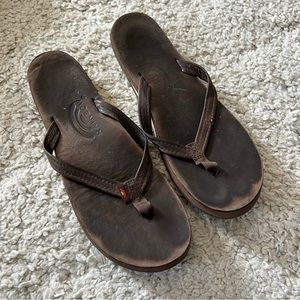 Worn Rainbow flip flops